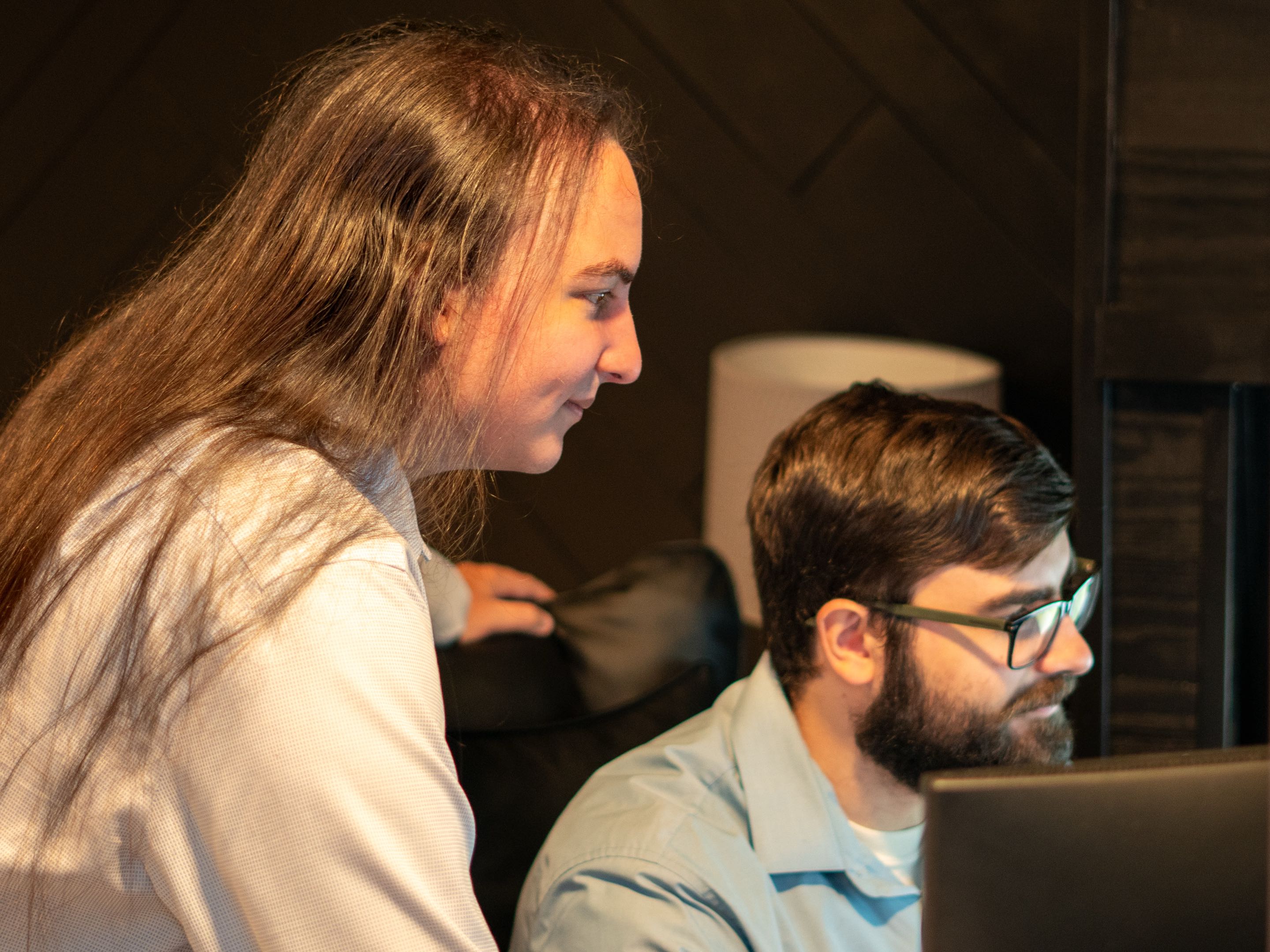 Billy Linker and Michael Linker working together at a computer